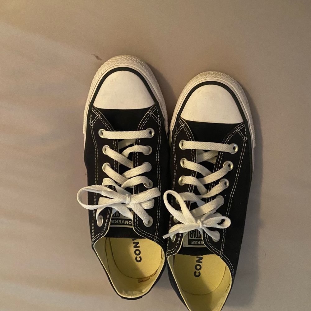Woman’s black converse